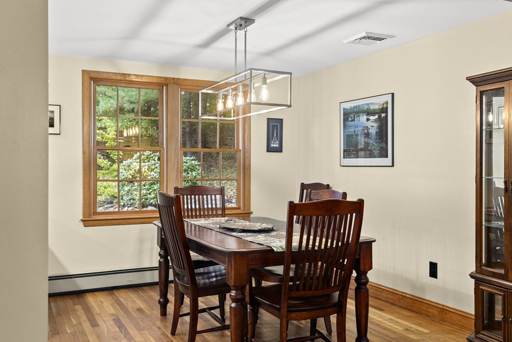 30 Eaton Road Framingham, MA 01701 - Photo 13 of 36 a dining room with furniture window wooden floor