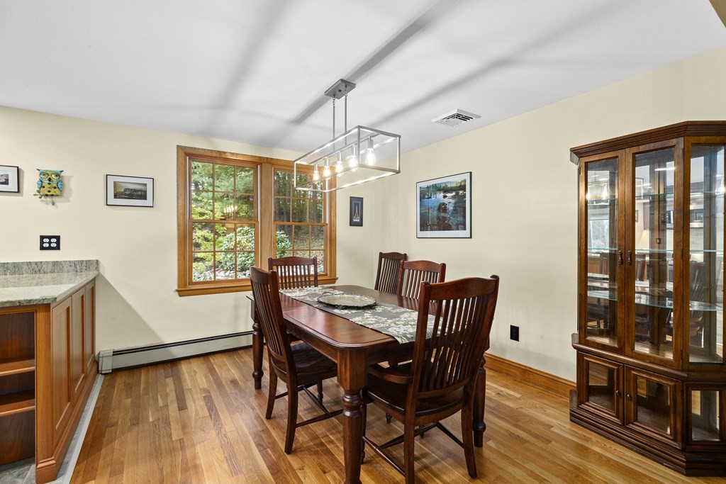 30 Eaton Road Framingham, MA 01701 - Photo 14 of 36 a view of a dining room with furniture window and wooden floor