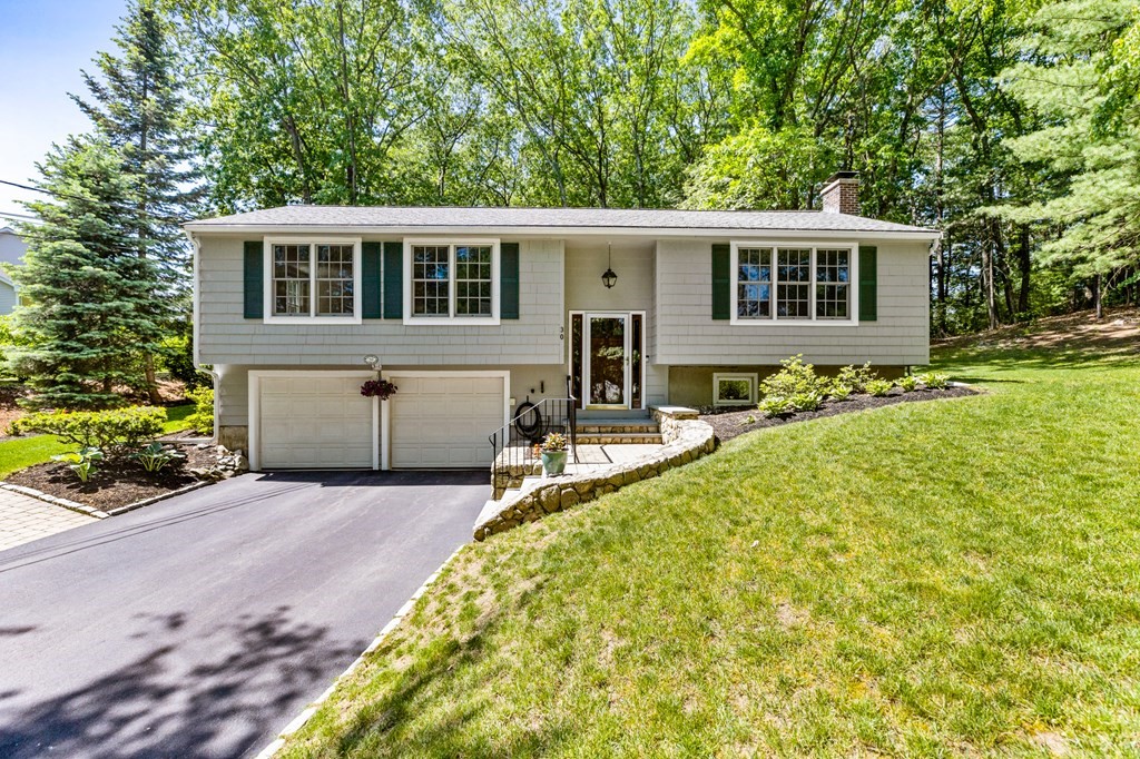 30 Eaton Road Framingham, MA 01701 - Photo 2 of 36 a front view of a house with a yard