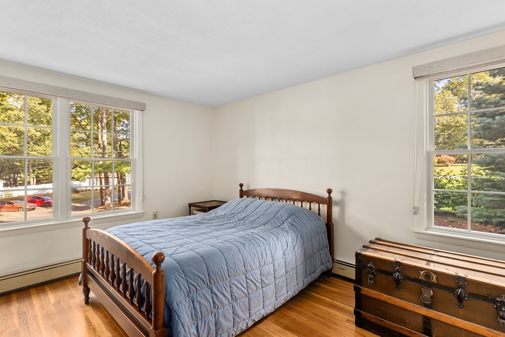30 Eaton Road Framingham, MA 01701 - Photo 22 of 36 a bedroom with a bed and a window