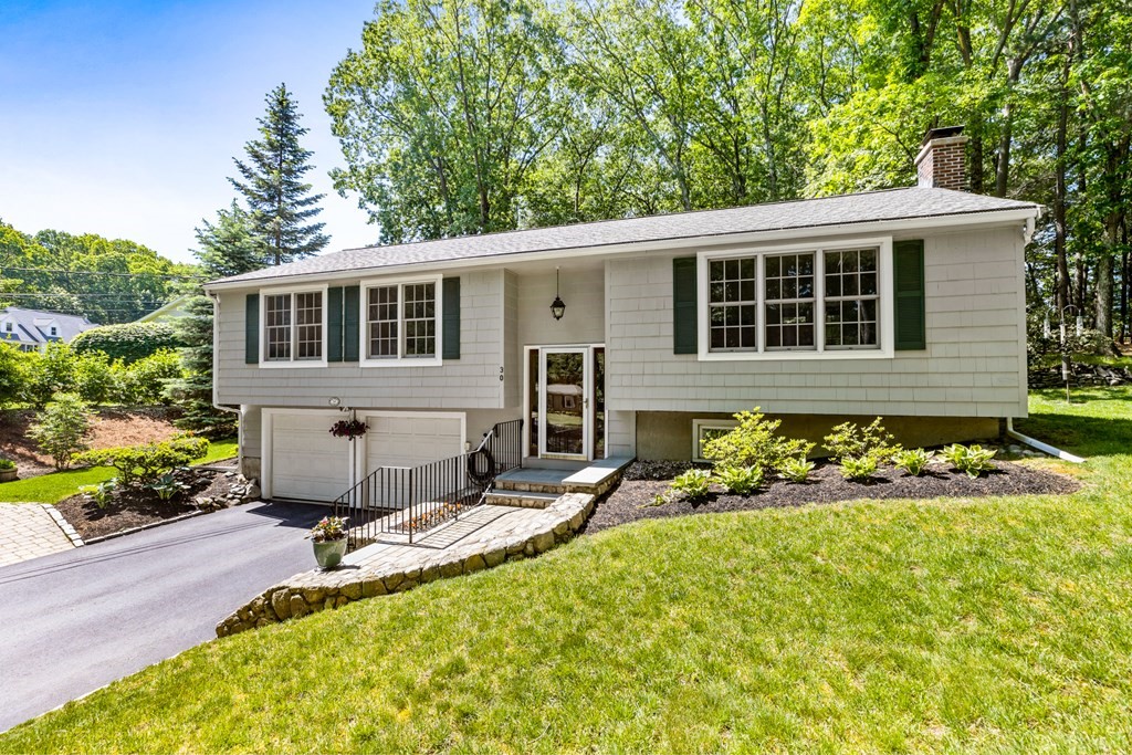 30 Eaton Road Framingham, MA 01701 - Photo 3 of 36 front view of a house with a yard