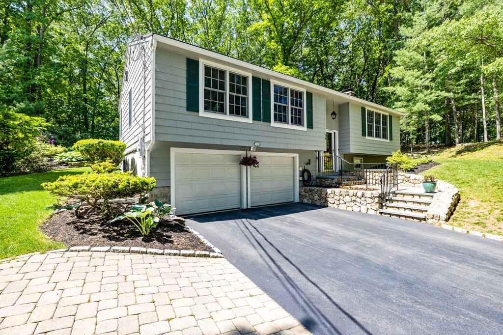 30 Eaton Road Framingham, MA 01701 - Photo 32 of 36 a front view of a house with garden