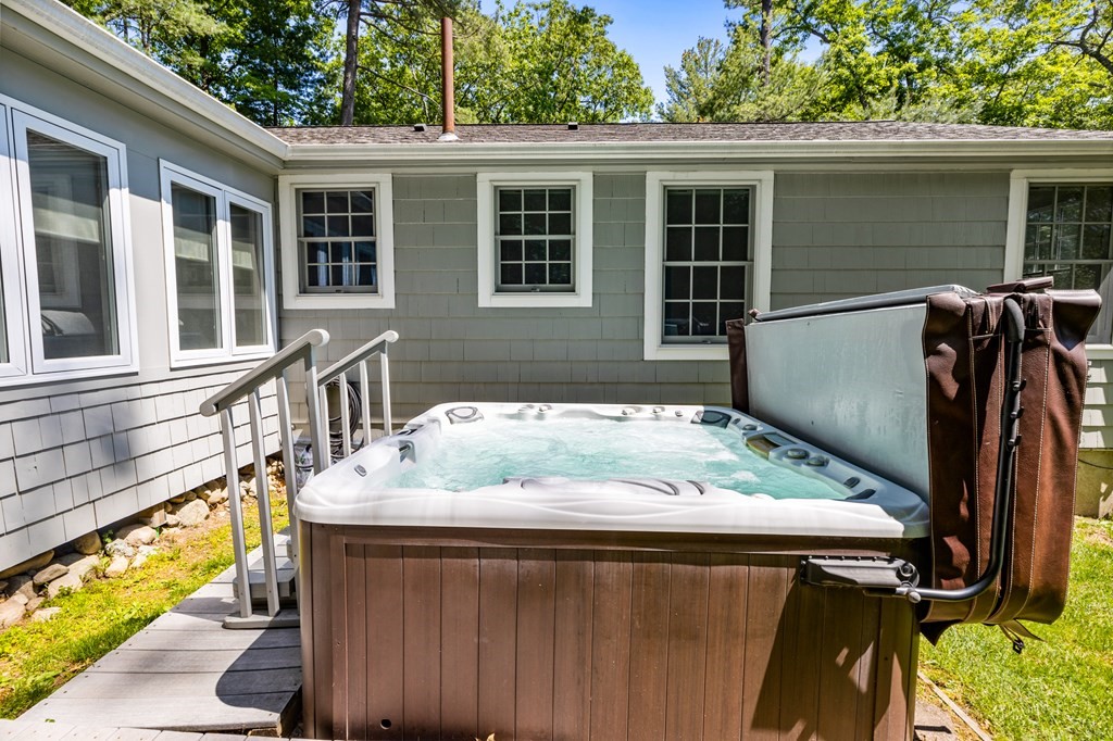 30 Eaton Road Framingham, MA 01701 - Photo 6 of 36 a roof deck with table and chairs and wooden floor