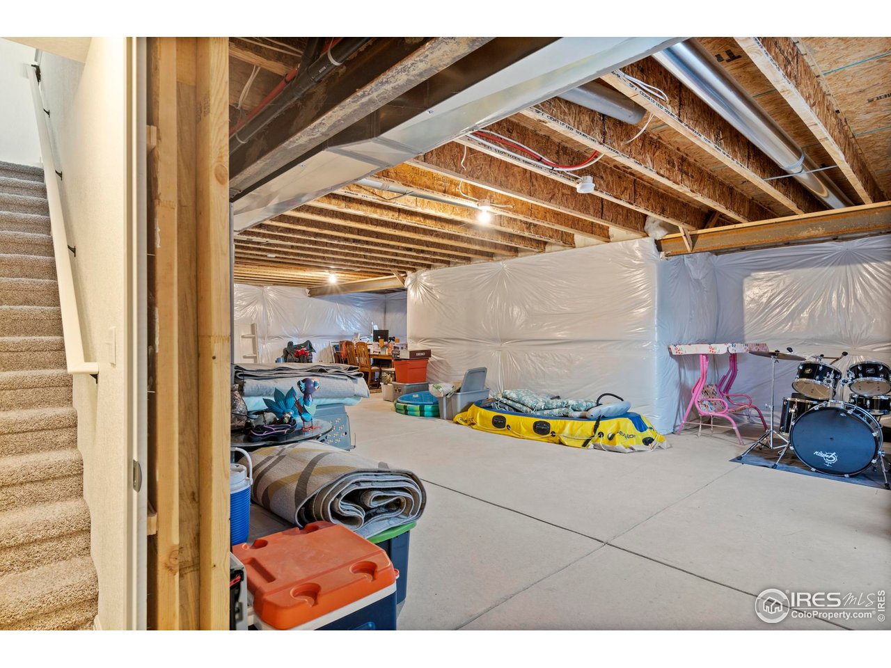 941 Barasingha Street Severance, CO 80550 - Photo 27 of 46 a view of a room with toys and plants