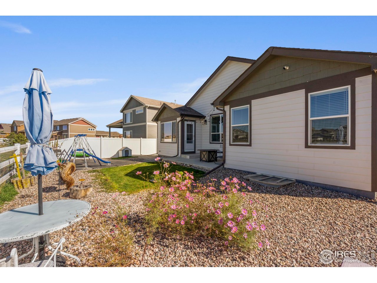 941 Barasingha Street Severance, CO 80550 - Photo 34 of 46 a front view of a house with a yard