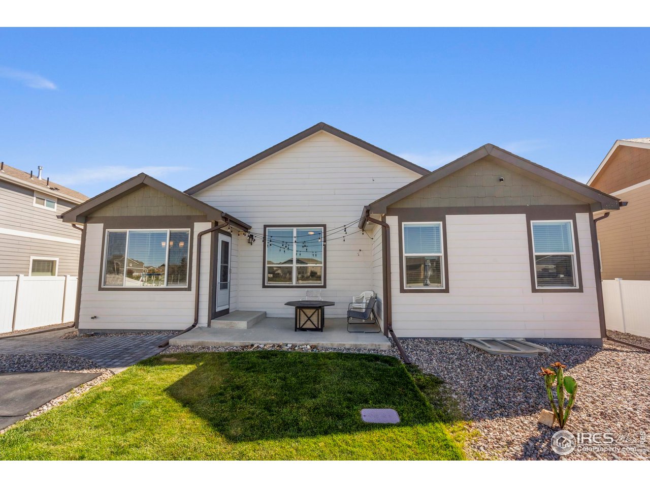 941 Barasingha Street Severance, CO 80550 - Photo 35 of 46 a front view of a house with a yard
