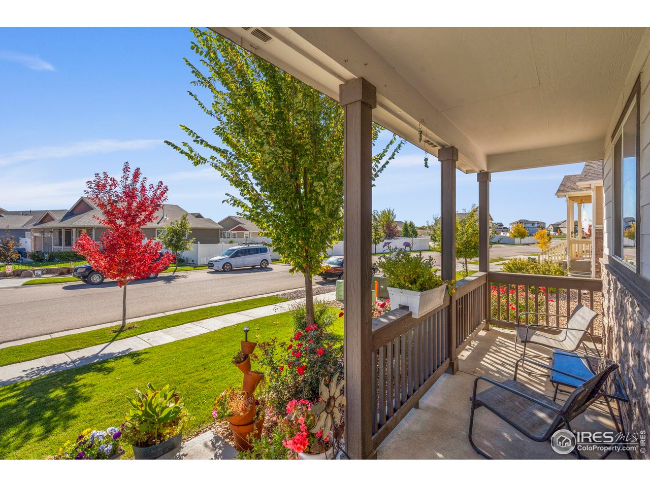 941 Barasingha Street Severance, CO 80550 - Photo 6 of 46 a view of a chairs and table in the balcony