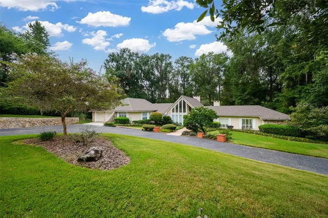a aerial view of a house with a garden