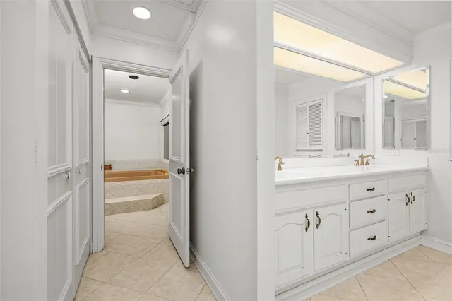 a bathroom with a shower and a glass door