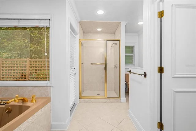 a view of an empty room with glass door