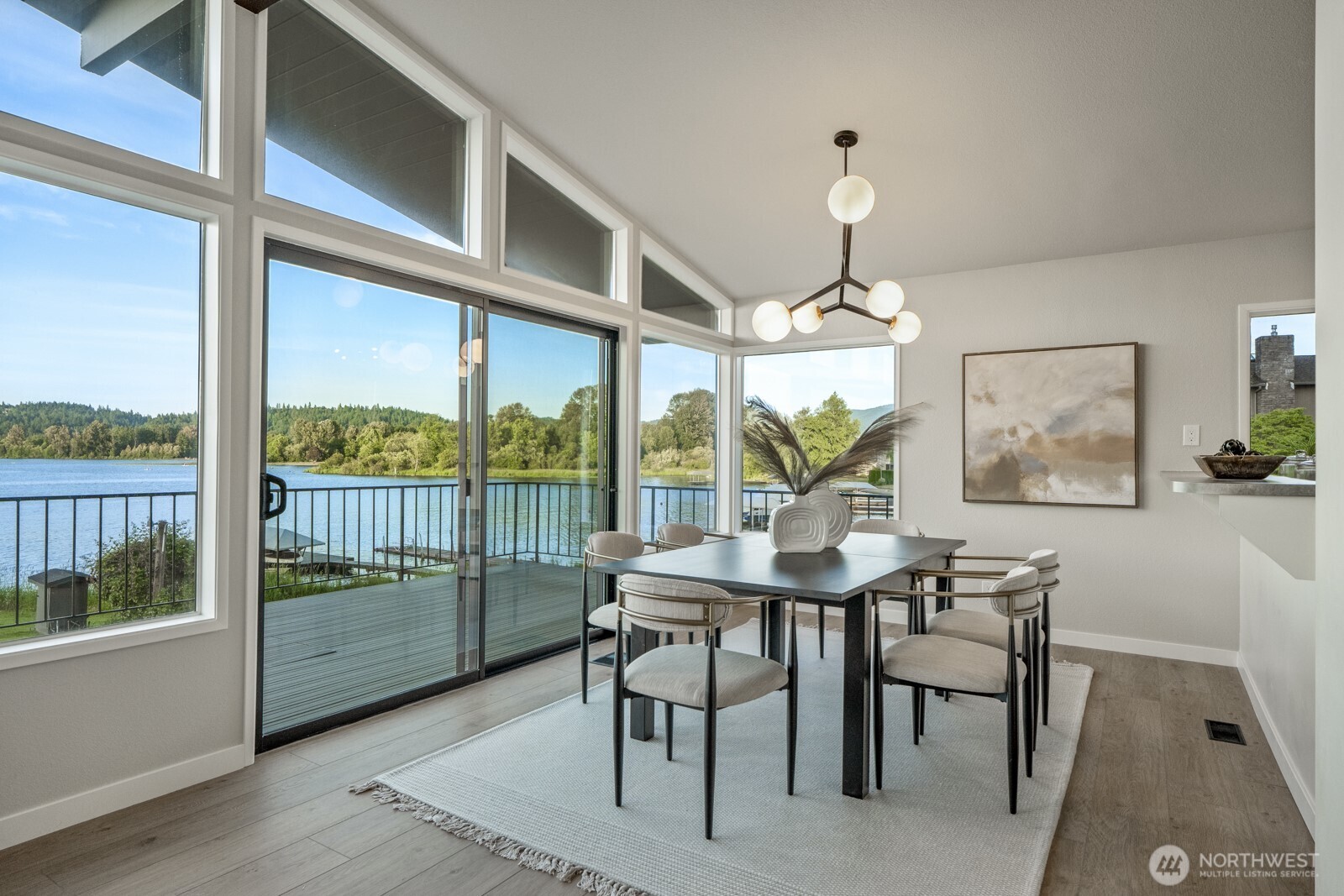 5110 Northwest Sammamish Road Issaquah, WA 98027 - Photo 11 of 40 a view of a dining room with furniture window and wooden floor