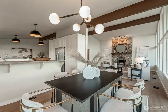 a kitchen with a table and chairs in it