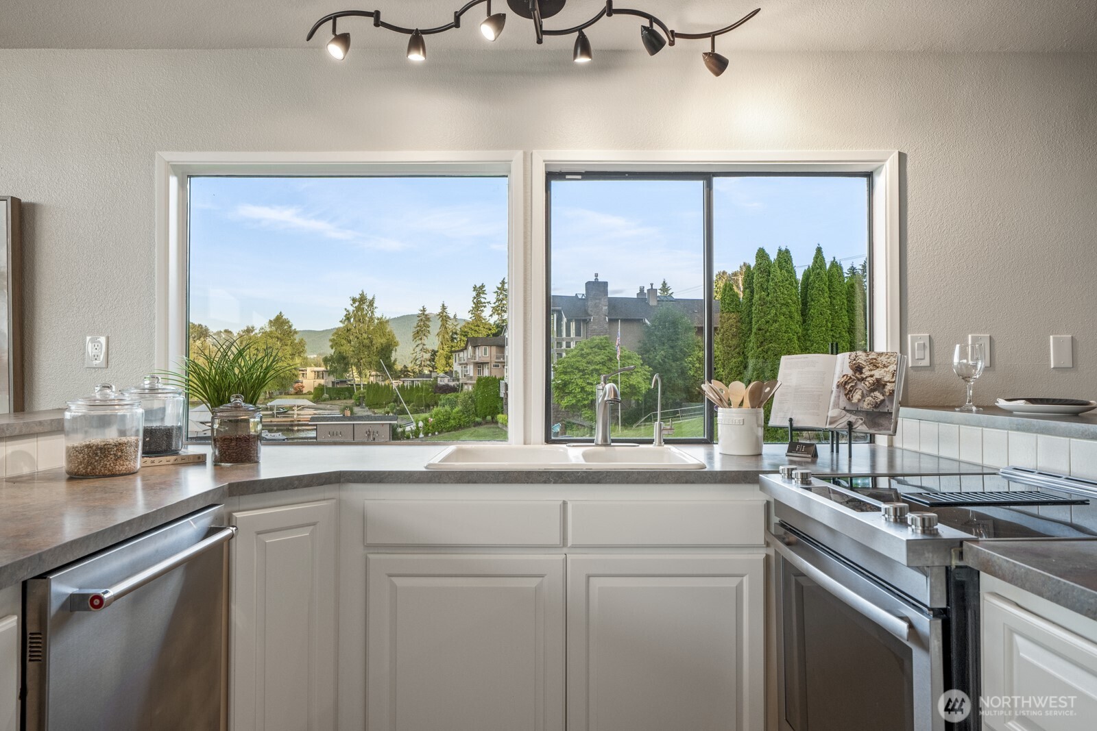 5110 Northwest Sammamish Road Issaquah, WA 98027 - Photo 16 of 40 a kitchen with a sink and large window
