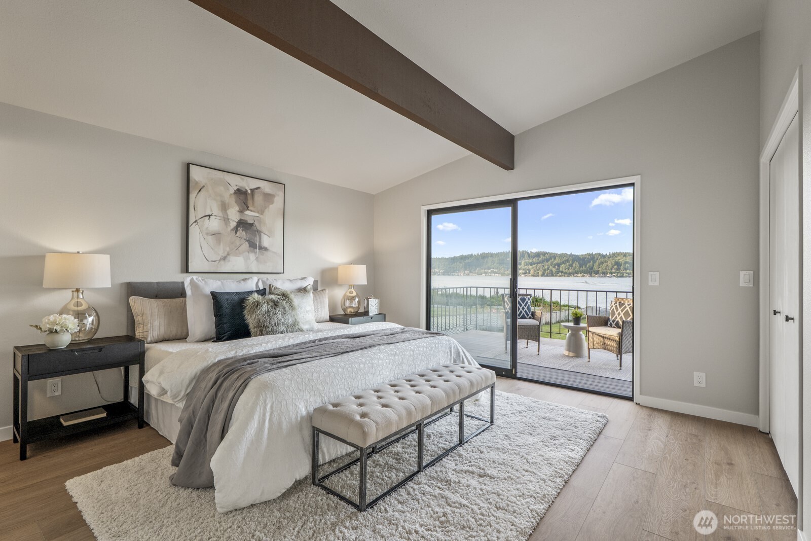 5110 Northwest Sammamish Road Issaquah, WA 98027 - Photo 25 of 40 a bedroom with a large bed and a large window