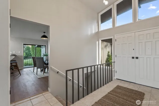 a view of a porch with wooden floor and a yard