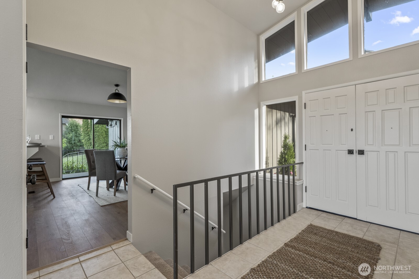 5110 Northwest Sammamish Road Issaquah, WA 98027 - Photo 28 of 40 a view of a porch with wooden floor and a yard