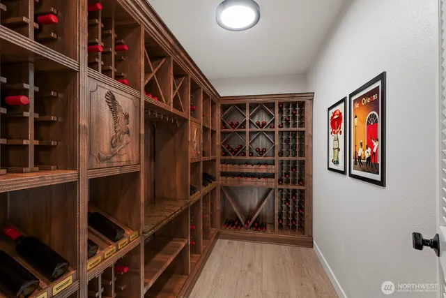 a view of front door with wooden floor