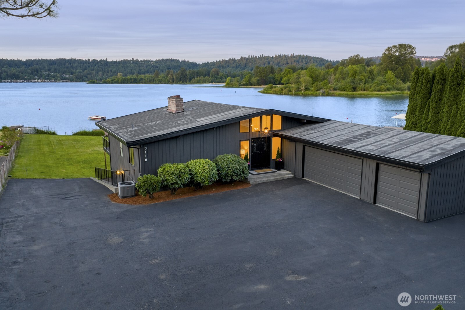 5110 Northwest Sammamish Road Issaquah, WA 98027 - Photo 3 of 40 a view of a terrace with a lake view