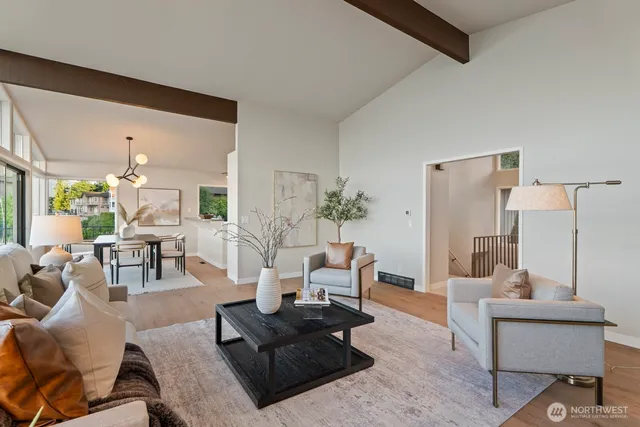 a living room with furniture and a table