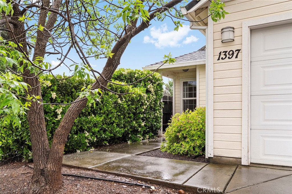 1397 Lucy Way Chico, CA 95973 - Photo 11 of 37 a front view of a house with garden