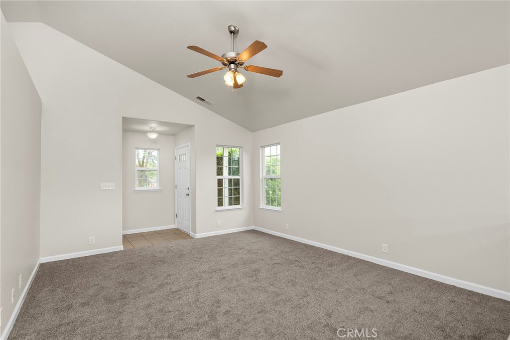 1397 Lucy Way Chico, CA 95973 - Photo 12 of 37 wooden floor in an empty room with a window