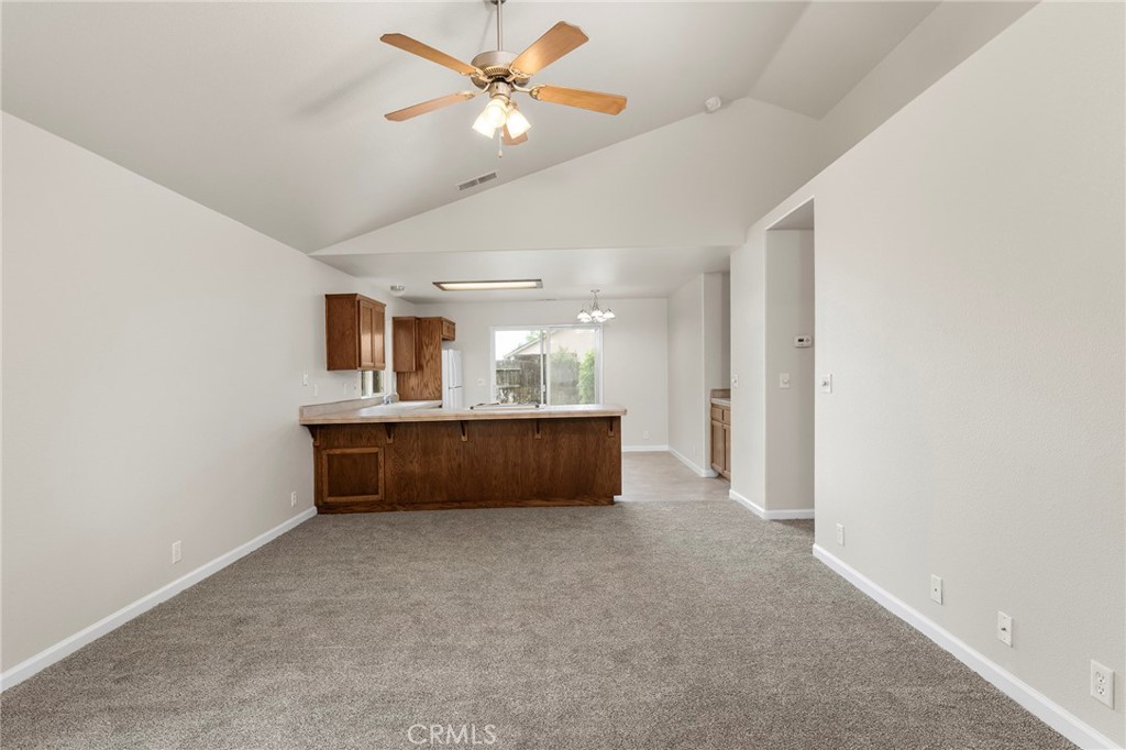 1397 Lucy Way Chico, CA 95973 - Photo 13 of 37 a living room with furniture and a ceiling fan