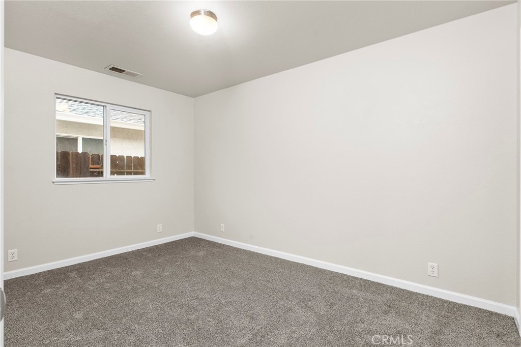 1397 Lucy Way Chico, CA 95973 - Photo 18 of 37 an empty room with a window
