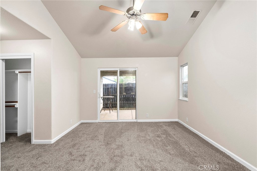 1397 Lucy Way Chico, CA 95973 - Photo 23 of 37 an empty room with chandelier fan