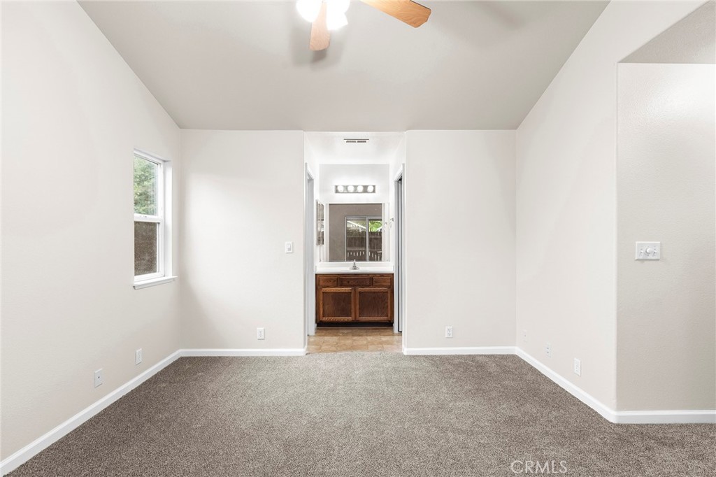 1397 Lucy Way Chico, CA 95973 - Photo 24 of 37 a view of an empty room with a window