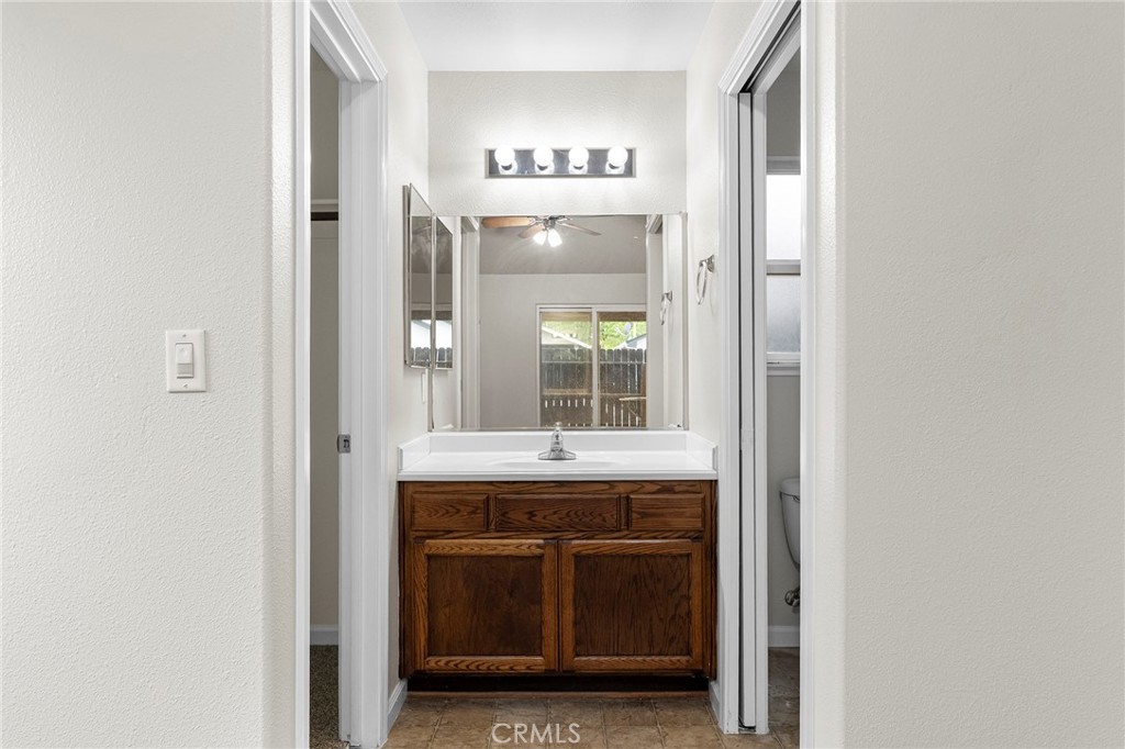 1397 Lucy Way Chico, CA 95973 - Photo 26 of 37 a view of kitchen with granite countertop cabinets and outdoor view