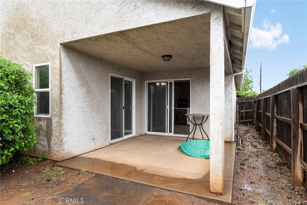 1397 Lucy Way Chico, CA 95973 - Photo 32 of 37 a view of a chair and table in the patio