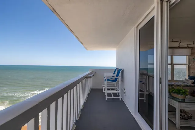a view of swimming pool with ocean view