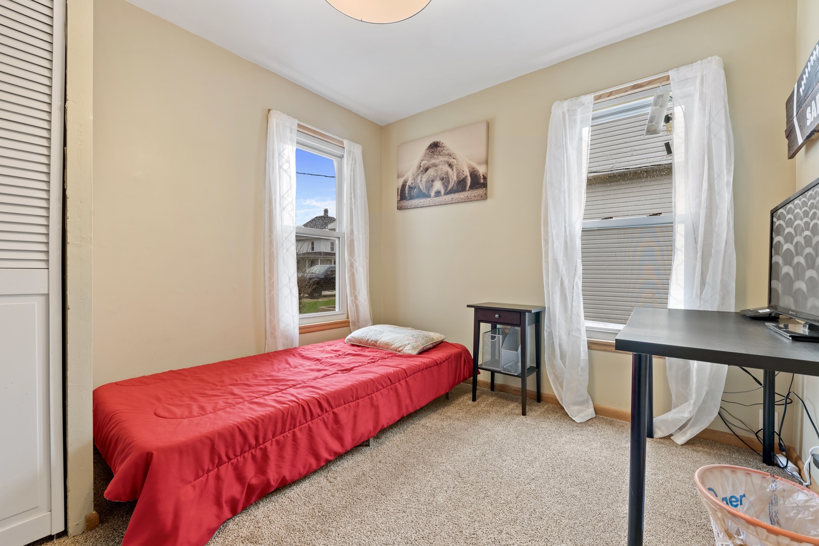 4552 Main Street Irwin, IL 60901 - Photo 15 of 37 a bedroom with a bed and a window