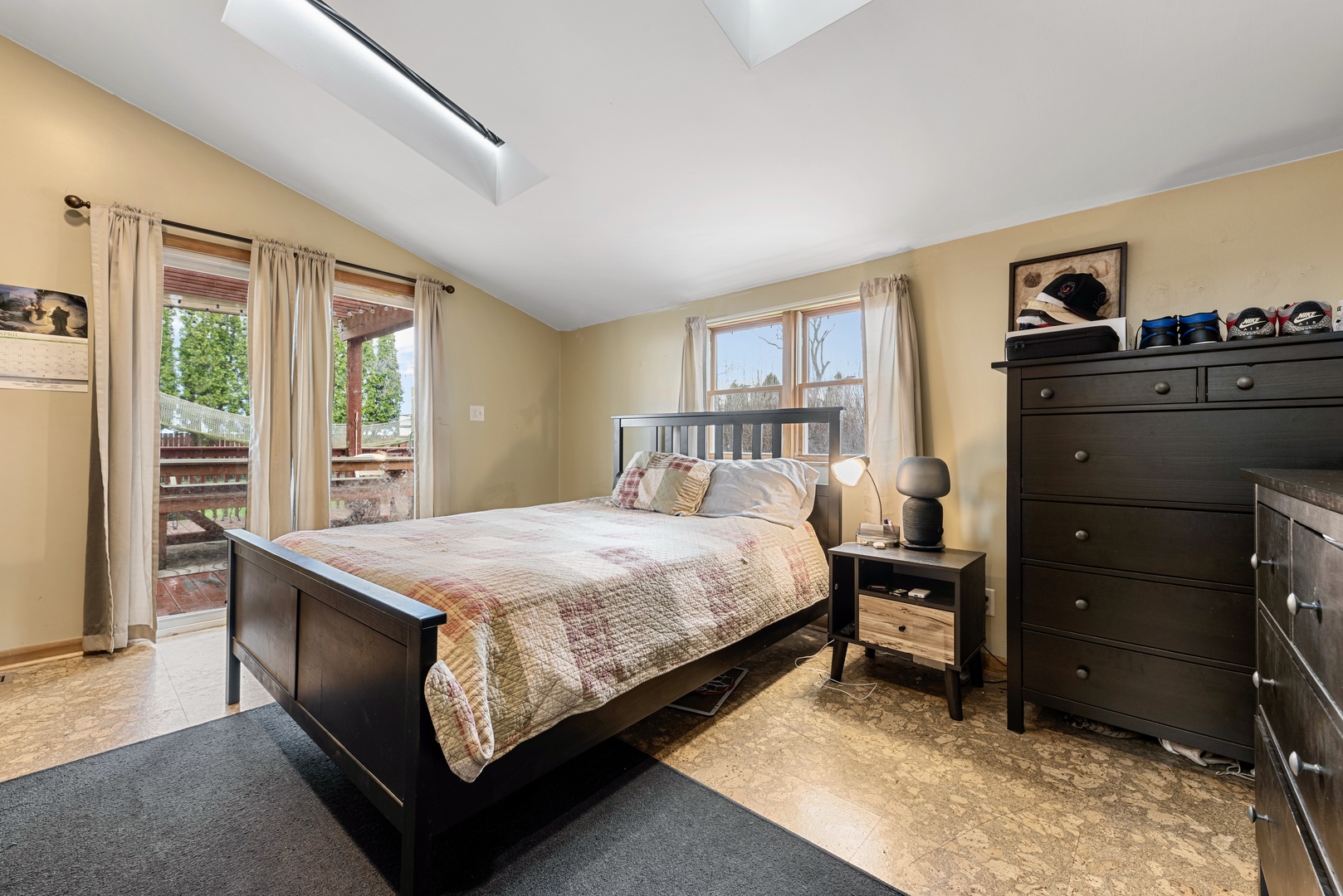 4552 Main Street Irwin, IL 60901 - Photo 16 of 37 a bed room with a bed and a dresser