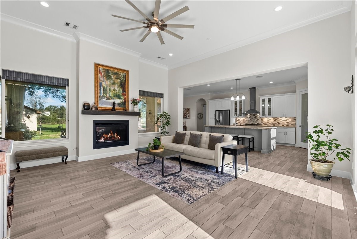 3706 Tower Road Santa Fe, TX 77517 - Photo 12 of 48 a living room with furniture and a fireplace