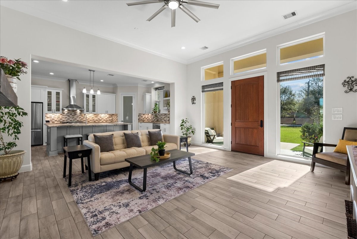 3706 Tower Road Santa Fe, TX 77517 - Photo 13 of 48 a living room with furniture and a large window