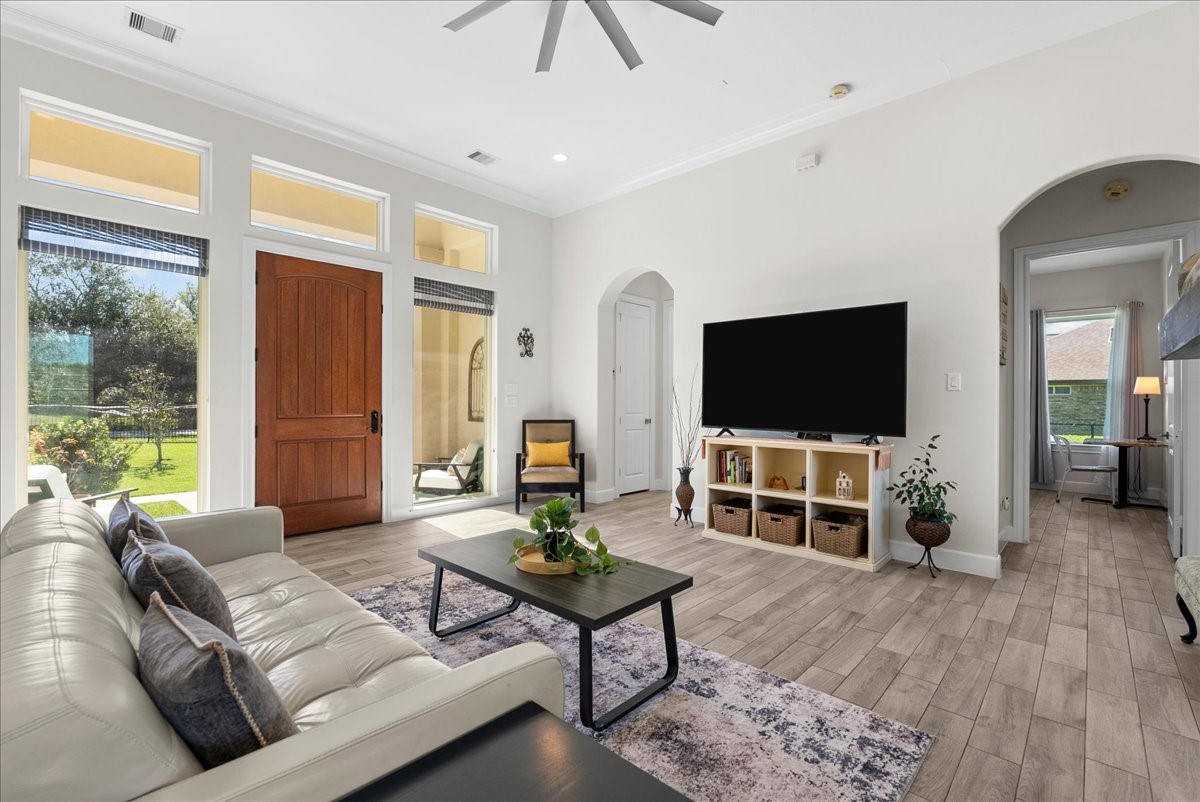 3706 Tower Road Santa Fe, TX 77517 - Photo 15 of 48 a living room with furniture and a flat screen tv