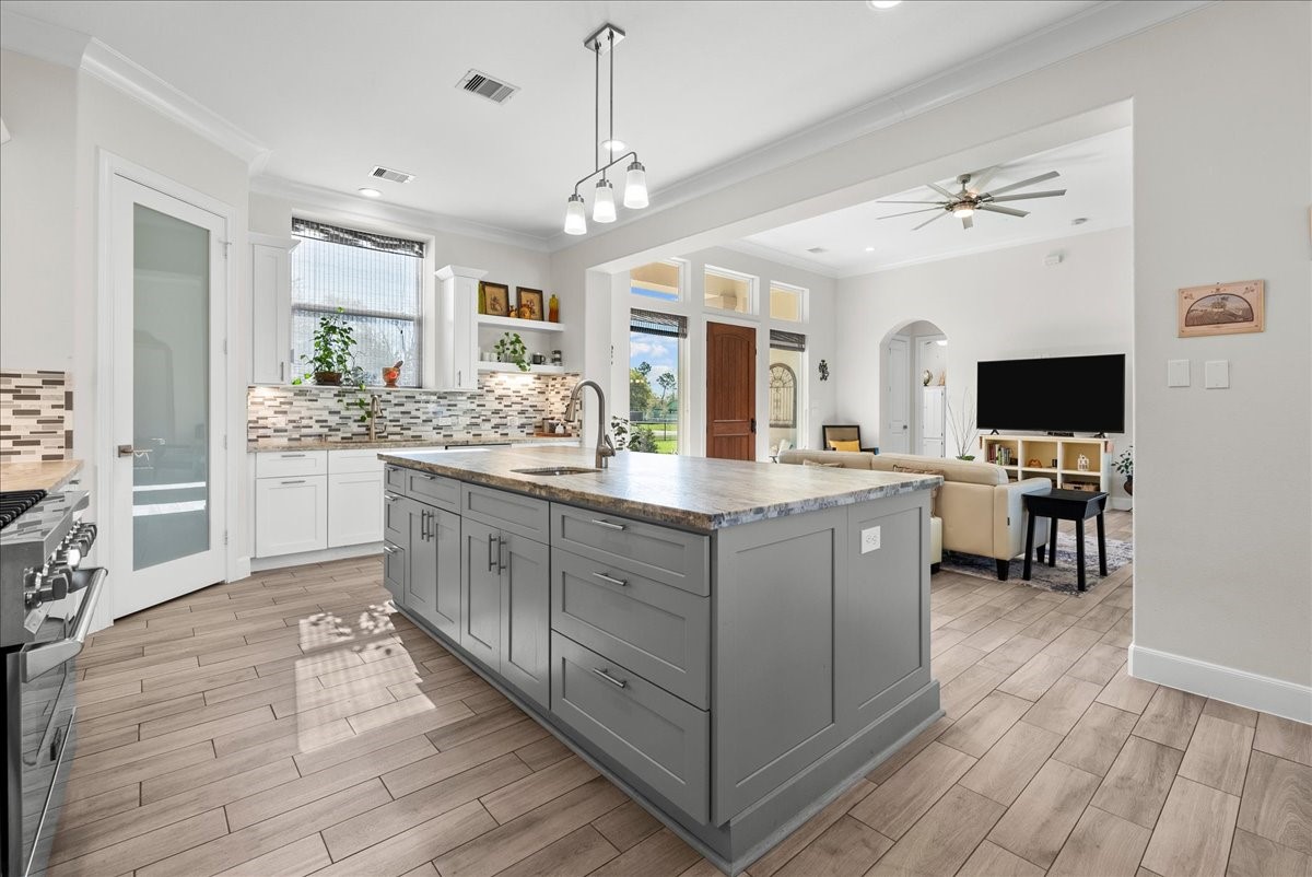 3706 Tower Road Santa Fe, TX 77517 - Photo 18 of 48 a bathroom with a sink double vanity and a mirror