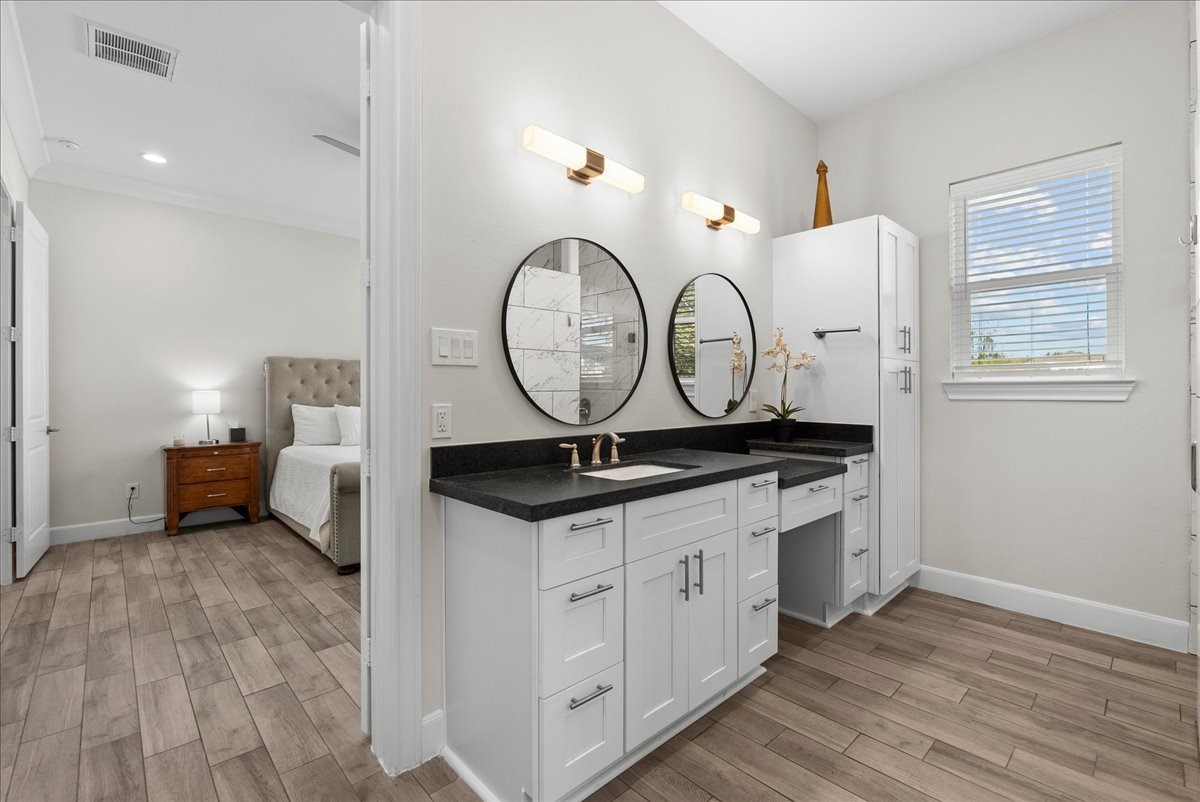 3706 Tower Road Santa Fe, TX 77517 - Photo 37 of 48 a spacious bathroom with a vanity and a mirror