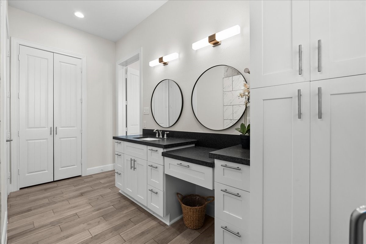 3706 Tower Road Santa Fe, TX 77517 - Photo 39 of 48 a bathroom with a sink and a mirror