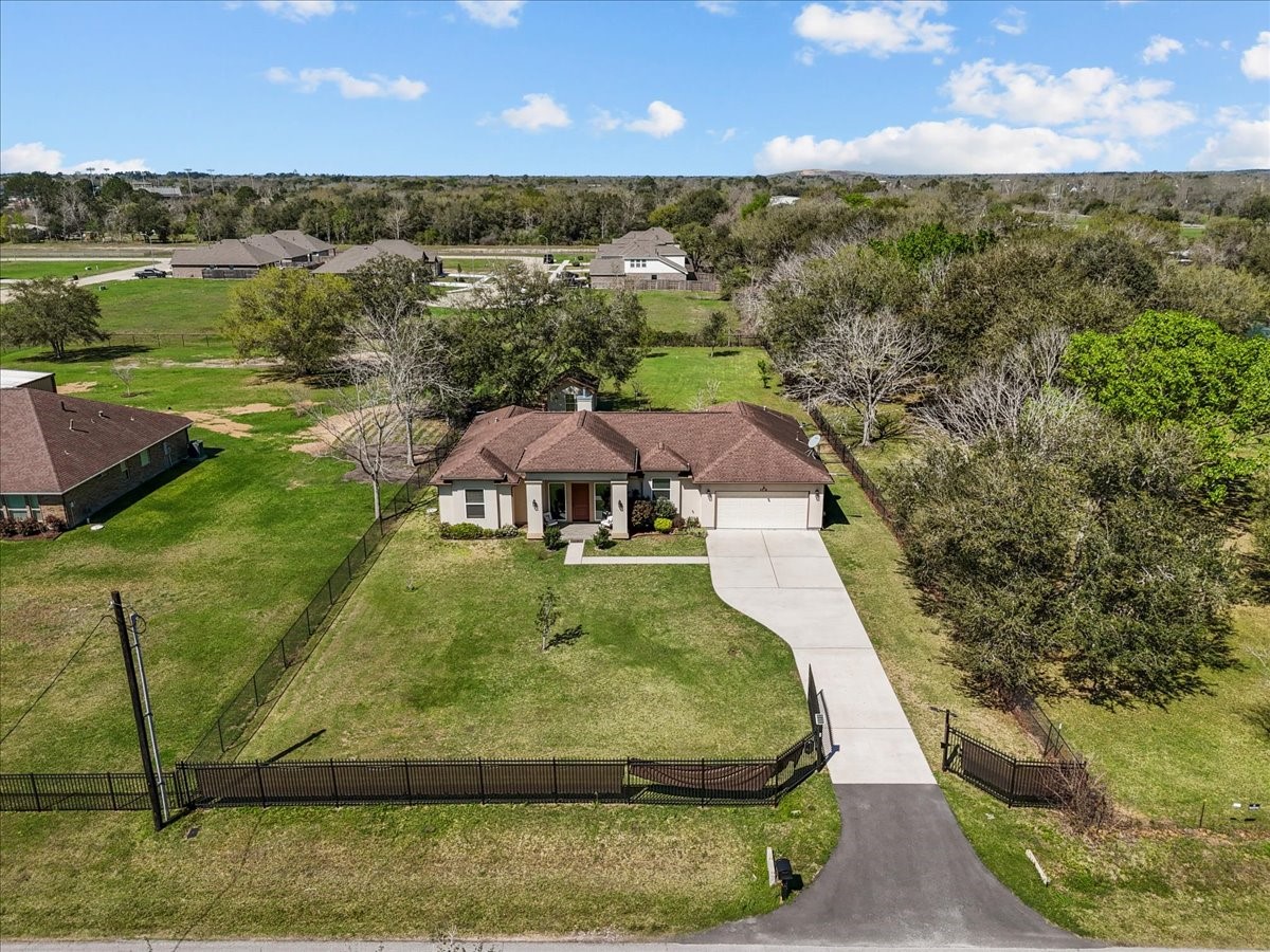 3706 Tower Road Santa Fe, TX 77517 - Photo 4 of 48 a view of a garden with an outdoor space