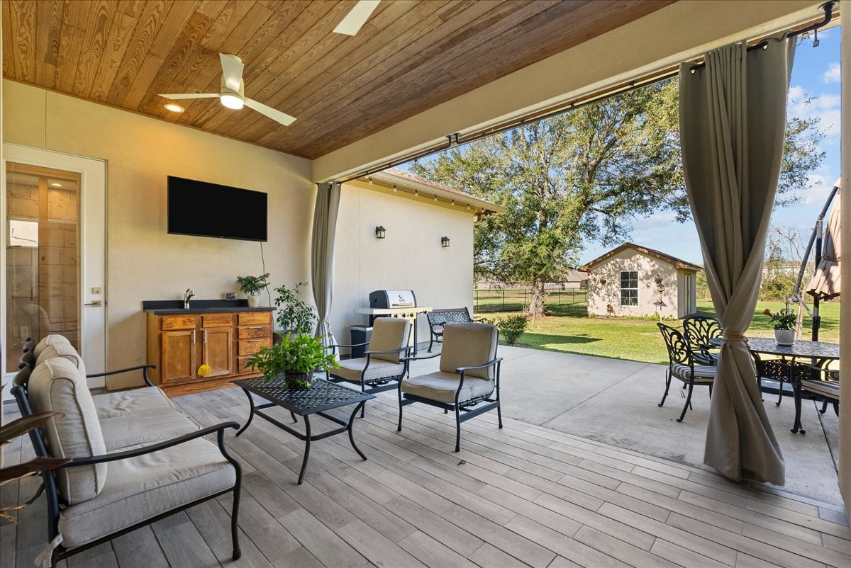 3706 Tower Road Santa Fe, TX 77517 - Photo 44 of 48 a living room with furniture and a large window