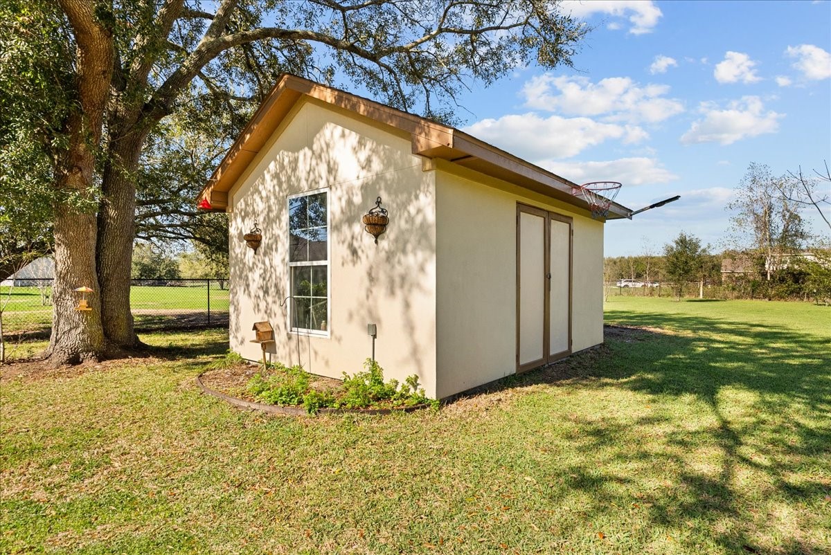 3706 Tower Road Santa Fe, TX 77517 - Photo 47 of 48 a view of a house with backyard and sitting area