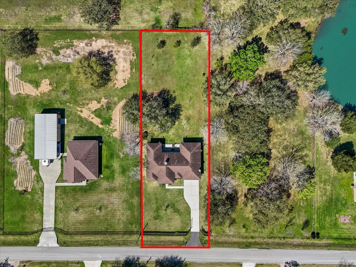 3706 Tower Road Santa Fe, TX 77517 - Photo 6 of 48 an aerial view of a house with a yard