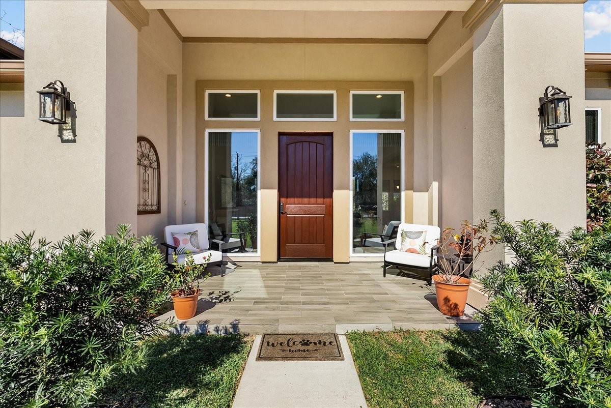 3706 Tower Road Santa Fe, TX 77517 - Photo 10 of 48 a front view of a house with garden