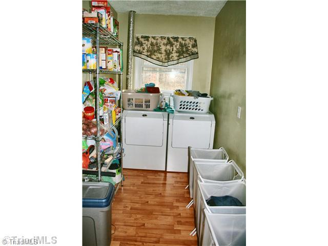 8114 Mccrory Road Stokesdale, NC 27357 - Photo 14 of 16 Laundry Room. Upstairs Laundry/Pantry