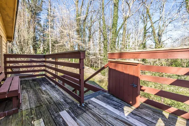 a view of a wooden floor with a bench