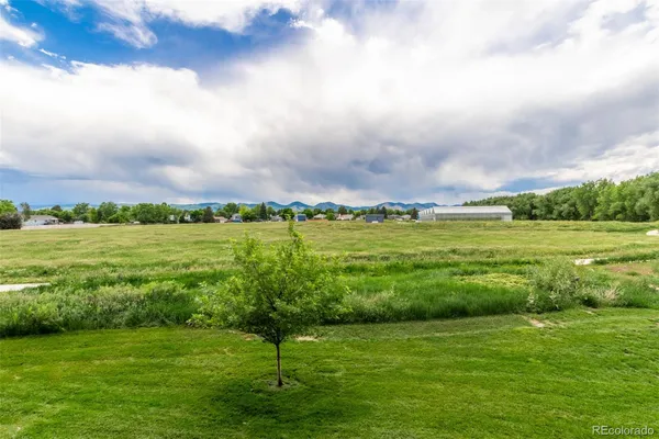 a view of balcony with chairs