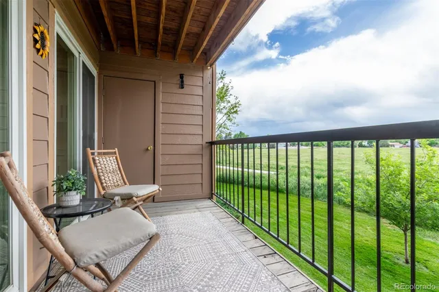 a view of house with swimming pool outdoor seating