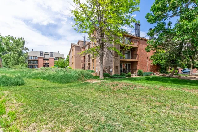 a view of a big yard next to a building